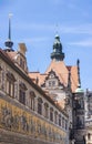 Dresden, Germany - June 28, 2022: View over the roofs of Dresden`s old town to the tower of the Hoflkirche. The Fuerstenzug