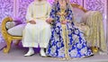 Dress the bride and groom in the wedding. Caftan Moroccan and Jellaba