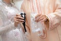 Dress the bride and groom in the wedding. Caftan Moroccan and Jellaba - Image