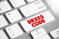 Dress code - set of rules with regards to what clothing groups of people must wear, text button on keyboard