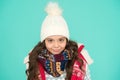 Dress in layers and wear hat. Stay active. it is cold outside. kid warm knitwear. winter vibes. Portrait of smiling girl Royalty Free Stock Photo