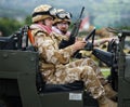 Dressed in modern British service battledress for desert locations.