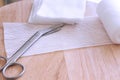 Dressing or clean wound tools includes Roll gauze,pile of gauzes and gauze roll cutter or scissors Royalty Free Stock Photo