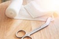 Dressing or clean wound tools includes Roll gauze,pile of gauzes and gauze roll cutter or scissors Royalty Free Stock Photo