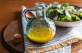 Dressing. Homemade salad dressing in an oil glass jar. Royalty Free Stock Photo