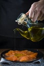 Dressing gravlax salmon with olive oil and dill Royalty Free Stock Photo