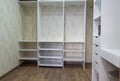 Dressing room wardrobe in the apartment spacious comfortable technical area of the apartment Royalty Free Stock Photo