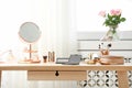 Dressing table with different makeup products and accessories