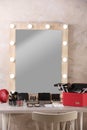 Dressing table with different makeup products and accessories Royalty Free Stock Photo