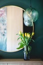 Dressing table with elegant round mirror. Home staging