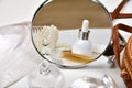 Dressing table with luxury cosmetic and skincare set, Cosmetic bottle containers with marine pearl extraction essence Royalty Free Stock Photo
