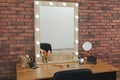 Dressing table with mirror in room interior Royalty Free Stock Photo