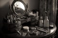 dressing table with mirror and makeup tray, ready for the morning routine