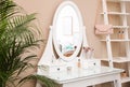 Dressing table with mirror in room interior Royalty Free Stock Photo