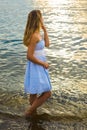 Young woman walking on water, relaxing Royalty Free Stock Photo