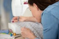 dressmaker woman working with sewing machine Royalty Free Stock Photo