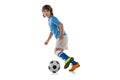 Portrait of preschool boy, football soccer player in action, motion training isolated on white studio background Royalty Free Stock Photo