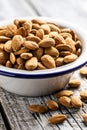 Dried almond nuts in bowl Royalty Free Stock Photo