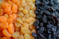 Dried apricots and raisins sultanas at the market. Naturally Dried apricots color orange. Dried apricots in the background. Mix