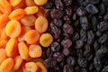 Dried apricots and raisins sultanas at the market. Naturally Dried apricots color orange. Dried apricots in the background. Mix