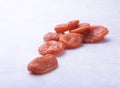 Dried apricots white background. selective focus. Royalty Free Stock Photo