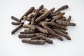 dried aromatic pippali long pepper on a white background Royalty Free Stock Photo