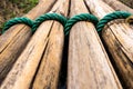 Dried bamboo tie with green nylon rope Royalty Free Stock Photo
