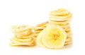 Dried banana chips snack stacked over white Royalty Free Stock Photo