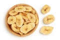 Dried banana chips in wooden bowl isolated on white background with full depth of field. Top view. Flat lay Royalty Free Stock Photo