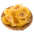 Dried banana chips in wooden bowl. Yellow deep fried slices of bananas Isolated on white background Royalty Free Stock Photo