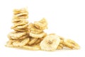 Dried banana slices isolated on white background. Pile of banana chips Royalty Free Stock Photo