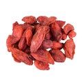 Dried barberry berries, folded in a heap and isolated on a white background, macro photo with the texture of berries