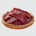 Dried beef jerky slices in bamboo basket Royalty Free Stock Photo