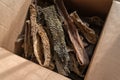 Dried beef offal. Dried tripe. A full cardboard box of chewy dog treats