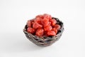 Dried berries in sugar on a white background.