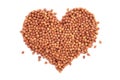 Dried black chickpeas in a heart shape Royalty Free Stock Photo