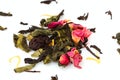 Dried black, green tea and fruit tea on white Royalty Free Stock Photo