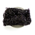 Dried black seaweed close up Isolated