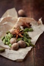 Dried cardamon pods, star anise and nutmeg