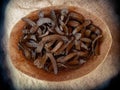 Dried carob pods close-up in a cork container.Isolated carob and carob Royalty Free Stock Photo