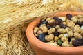 Dried cereal seeds and fruits with stalks of wheat ears Royalty Free Stock Photo