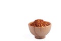 dried chili peppers in a wooden cup on a white background Royalty Free Stock Photo