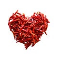 Dried chilies are arranged in a heart shape on white background Royalty Free Stock Photo