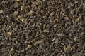 Dried Chinese Oolong Se Chung tea leaves close up full frame
