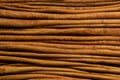 Dried cinnamon bark strips background Royalty Free Stock Photo