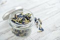 Dried Clitoria flowers in jar