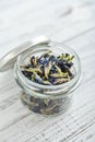 Dried Clitoria flowers in jar