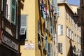 Dried clothes hanging outside the windows Royalty Free Stock Photo