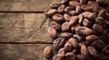 Dried cocoa beans and dried cocoa pods on wooden background