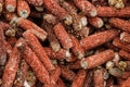 Dried corn cobs shelled after the corn kernels picked by machine Royalty Free Stock Photo